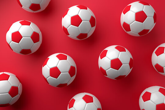 Football soccer balls on red background. Top view. 3D rendering.