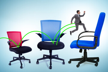 Promotion concept with businessman and chairs