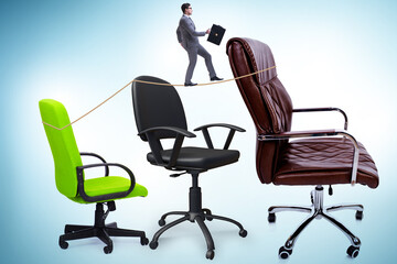 Promotion concept with businessman and chairs