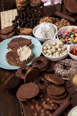 Chocolate cream on a bread and heap of a sweets