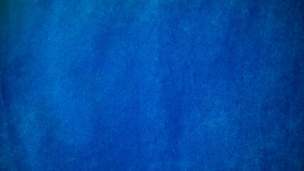 blue velvet fabric texture used as background. Empty blue fabric background of soft and smooth...