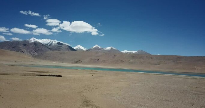 view of the lake snowcap mountains