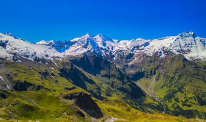 Fototapeta na wymiar Aerial view of Grossglocker mountain peaks in summer season, drone viewpoint.