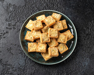 Shortcrust pastry Mini fish pies filled with cod and salmon in a creamy sauce topped with a parsley breadcrumb