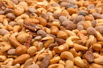 A group of almonds, pistachios, walnuts, macadamia, cashews.