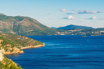 Summer evening landscape near Dubrovnik, Croatia, featuring sea and mountain coastline. Travel or nature abstract background.