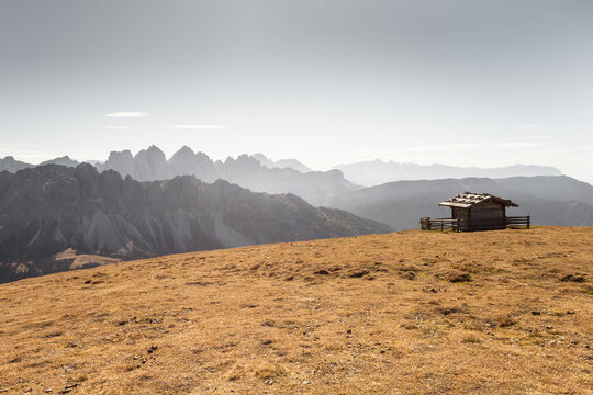Single cabine over a mountain in Dolomites with wonderful panorama at fall