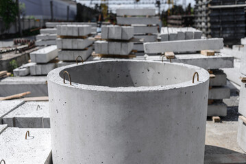 Reinforced concrete ring of the septic tank, storage area of the reinforced concrete plant.