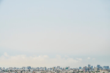 heaven and clouds over small city