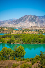 Fototapeta premium Mountain Lake. Emerald water reservoir behind the dam Oymapinar. Green Canyon in Manavgat region, Turkey.