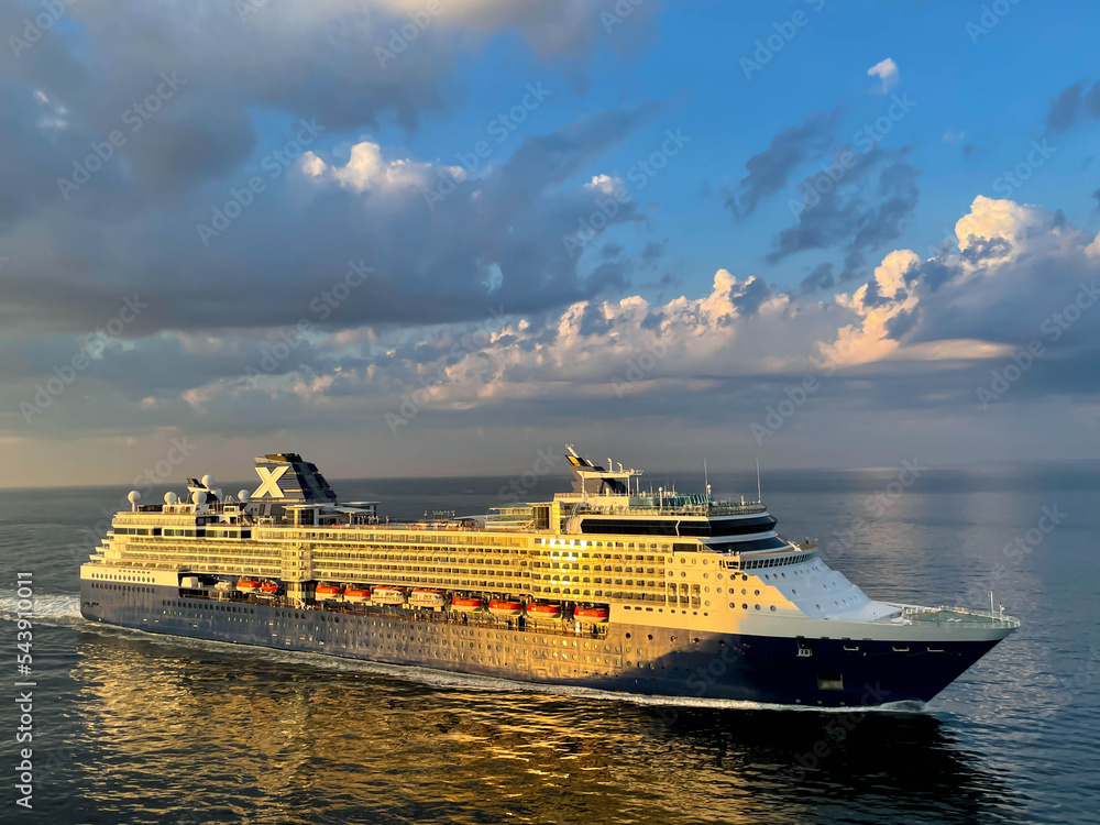 Wall mural luxury cruise liner sailing during sunset