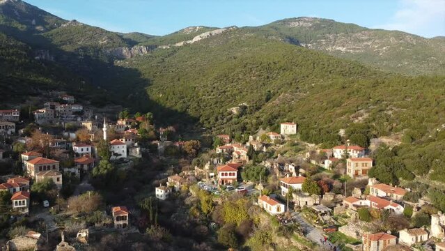 Aerial view of scenic Doganbey village on a sunset light, Turkey