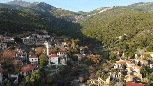 Aerial view of scenic Doganbey village on a sunset light, Turkey