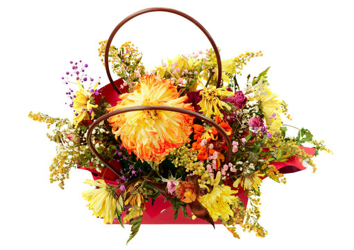 Old withered boquet of asters, chrysanthemum and roses isolated on white