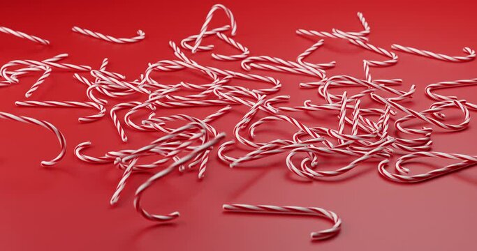 Red and white candy canes falling down on red background 3D render. Festive concept with sweets stick candy
