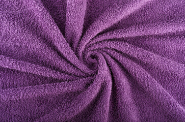 Fototapeta na wymiar twisted purple towel