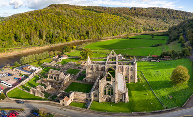 Aerial view of an ancient ruined monastery in Wales (Tintern Abbey. 12th century AD) - obrazy, fototapety, plakaty