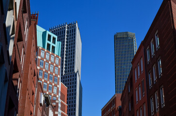 Exterior of beautiful modern buildings against blue sky