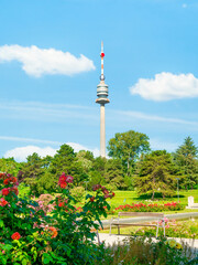 Obraz premium View with The Donauturm(Danube Tower) located in Donau Park. Iconic tower with observation terraces. Famous touristic attraction