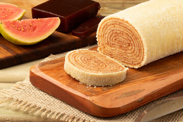Traditional Brazilian roll cake on cutting board.