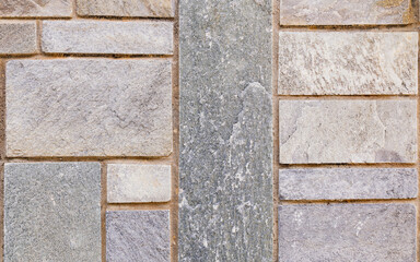 Surface laid with gray granite slabs cut to various sizes.