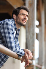 rear view of casual man standing outdoors