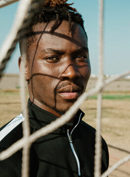 soccer man person in the park inside soccer goal 