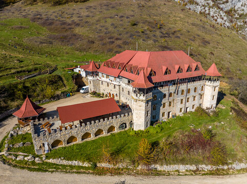 Romania - Old historical restaurant near Torocko town in Transylvania from drone view
