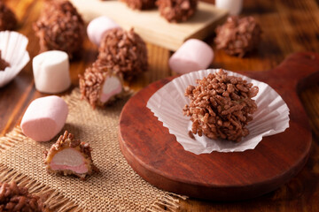 Homemade Caramel Marshmallows covered in chocolate flavor puffed rice, sweet treat easy to make, no baking required, ideal for parties and festivities, Christmas favorites.