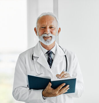 senior elderly gray hair active doctor hospital medical medicine health care clinic office portrait glasses man stethoscope specialist