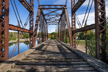 Old rusted girders of a railway bridge