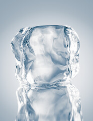 Natural crystal clear melting single ice cube on white background with reflection.