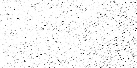 Small uneven spots and particles of debris. Abstract vector texture. Distressed uneven background. Grunge texture overlay with fine grains isolated on white background. Vector illustration. EPS10.