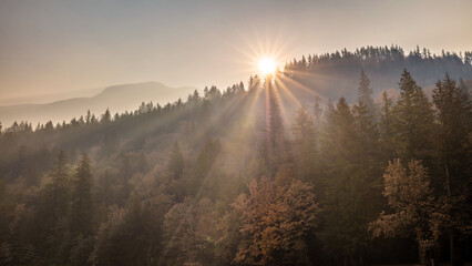 Sun Rising over Smoky Mountains at Cultus Lake, BC.