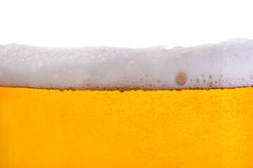 Tasty beer with foam in glass, closeup