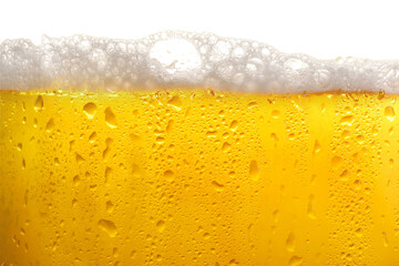 Glass of tasty cold beer with foam and condensation drops on white background, closeup