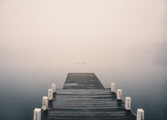 autumn weather with fog over water