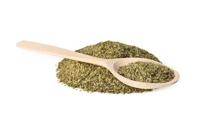 Pile of aromatic mate tea and spoon on white background