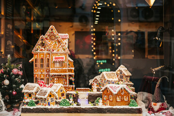 Gingerbread houses in urban holiday showcase. Christmas concept