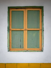Green and Yellow Window and a White Background, Characteristic of the Town of Jerico, Antioquia, Colombia