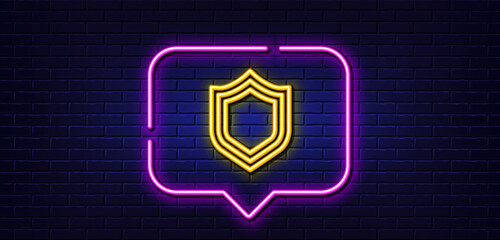 Neon light speech bubble. Shield line icon. Protection or Security sign. Defence or Guard symbol. Neon light background. Security glow line. Brick wall banner. Vector