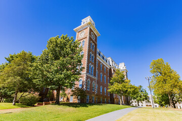 Fototapeta na wymiar Sunny exterior view of the Old Main of University of Arkansas