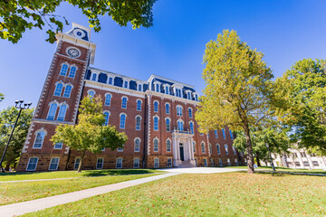 Sunny exterior view of the Old Main of University of Arkansas