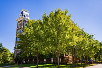 Sunny exterior view of the Old Main of University of Arkansas