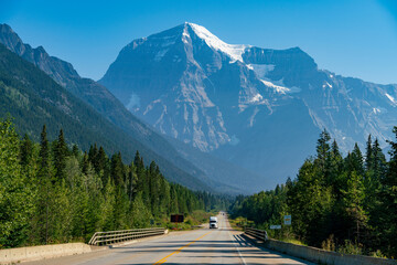 Mt Robson in summer from the road with sign "beware of the deers"