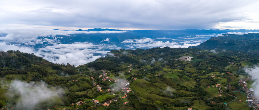 Jerico Rural Landscape Colonial Farm Houses and Green Meadows Against Cloudy Sky