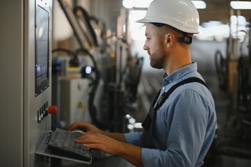 Factory worker. Man working on the production line.