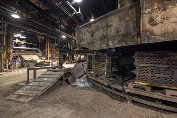 Turned off the conveyor of the old foundry for the production of cast iron parts