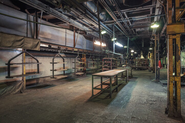 Overhead conveyor in an old car parts factory