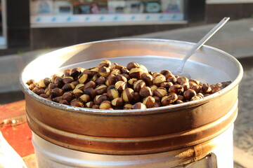 Fresh roasted chestnut on a roasting stall